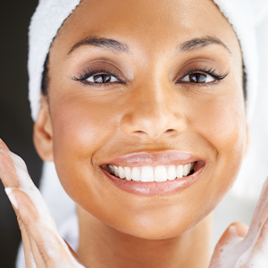 Shop for Skin Cleansers - Woman with a fresh face and a big smile