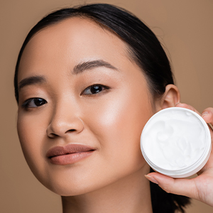 Shop for Moisturizers - Asian woman with a skincare cream