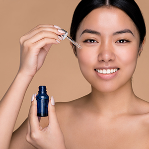 Shop for skincare serums - Woman using serum on her face
