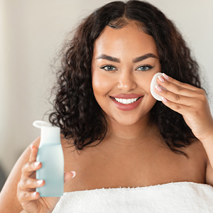 Shop for Toners - woman using skincare toner